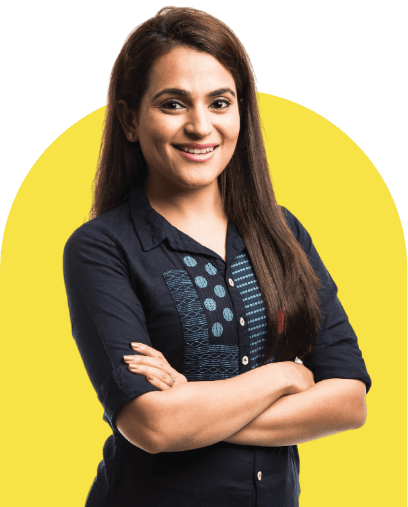 A smiling woman with her arms folded